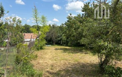 *Na predaj* záhrada v centre obce Šterusy